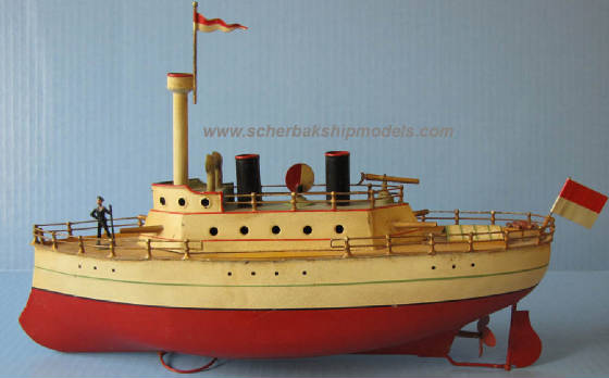 Carette toy tin clockwork gun boat 14.5in long.jpg