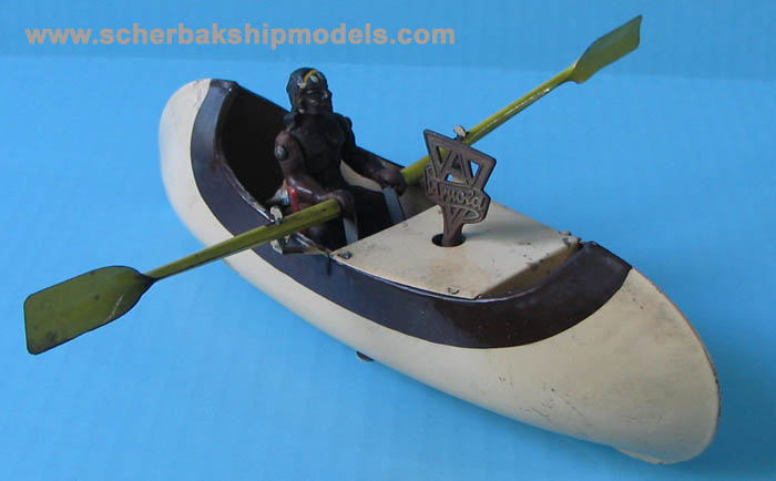 arnold rowing canoe tin boat clockwork.jpg
